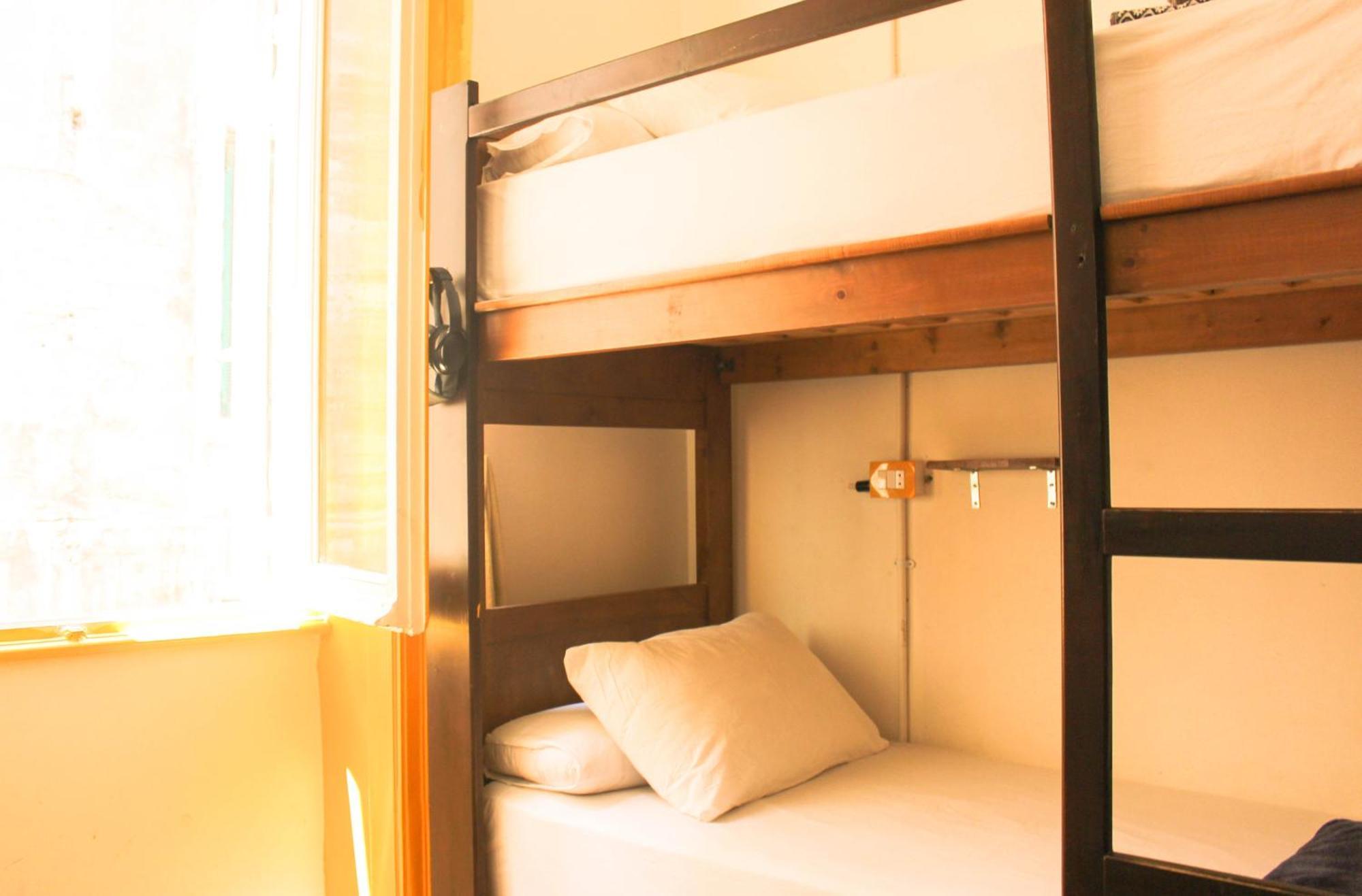 Bed in 6-Bed Male Dormitory Room (City view)